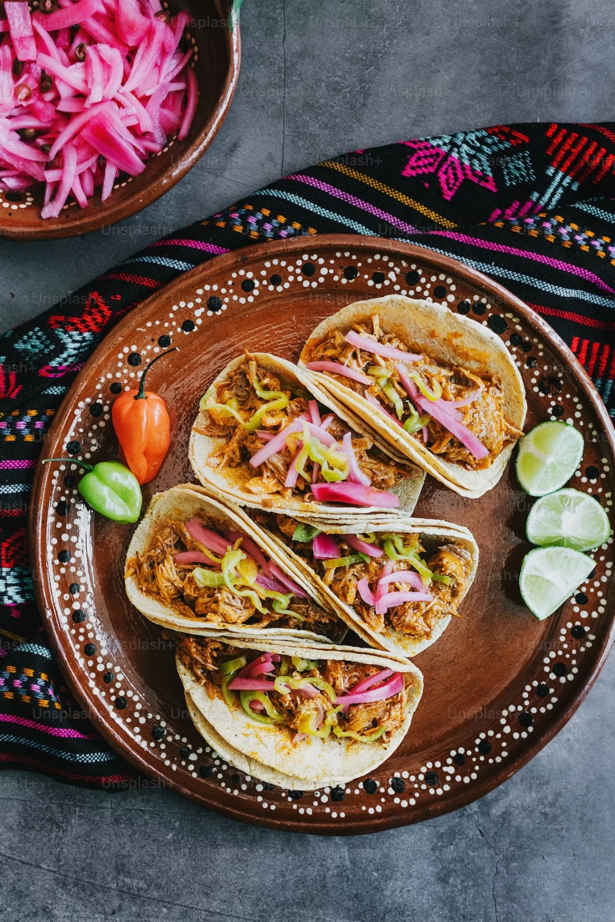 Tacos with pickled onions and lime