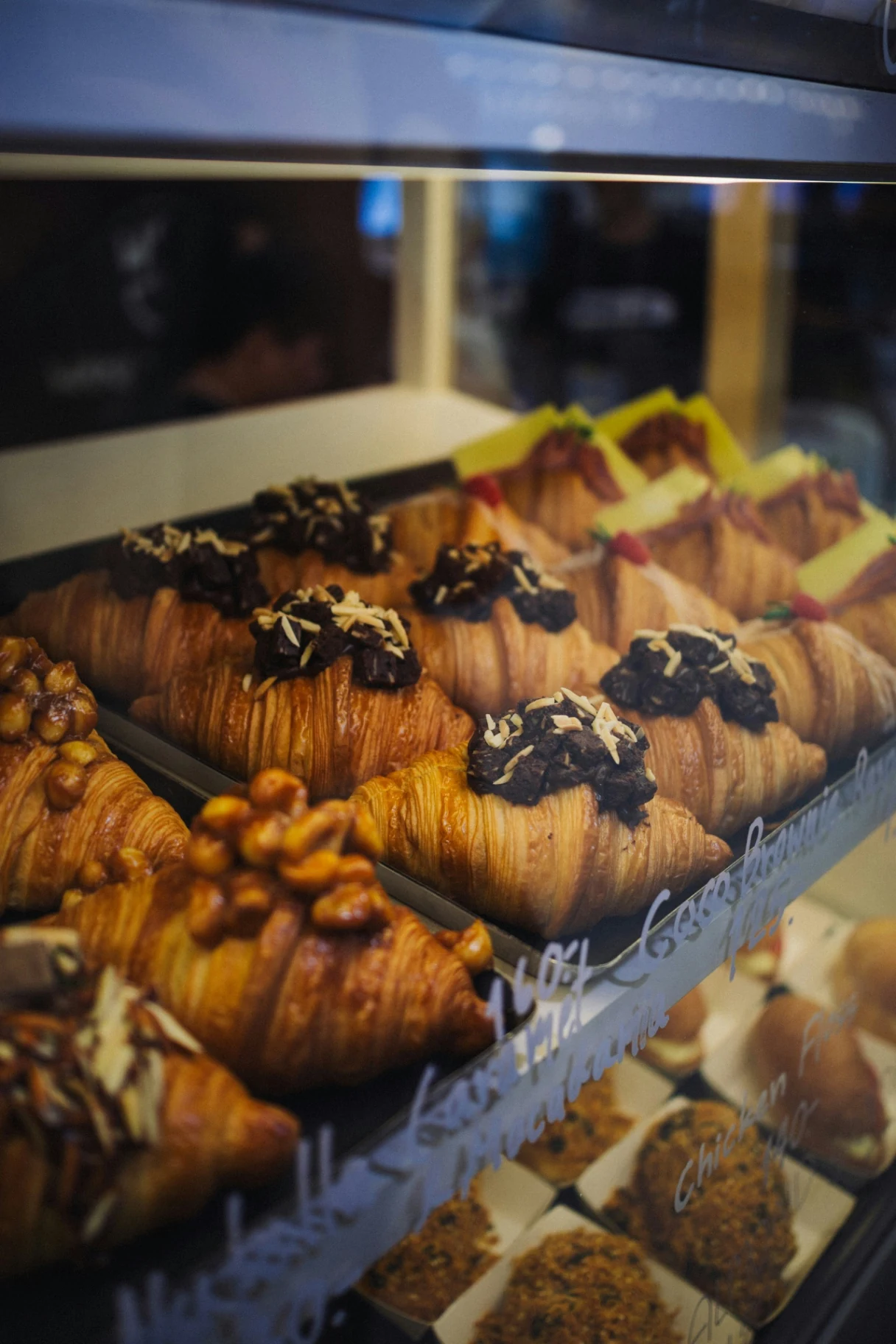 Fresh croissants in a bakery display