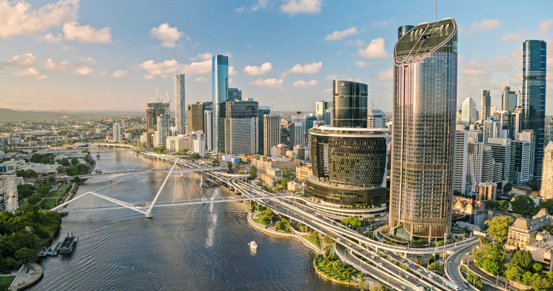 Aerial view of the Brisbane River, bridges and city skyline